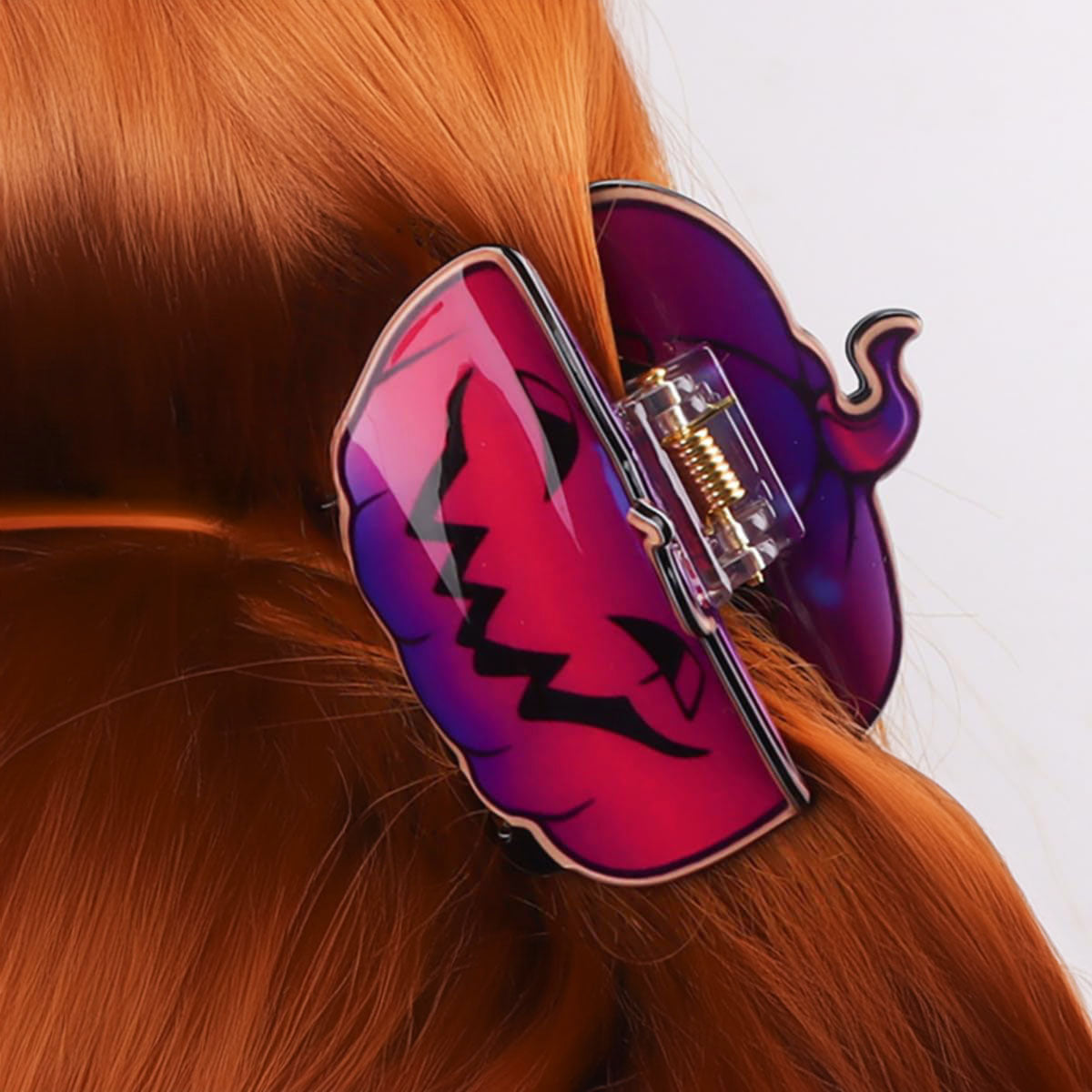 resin hair clip claw pumpkin logo