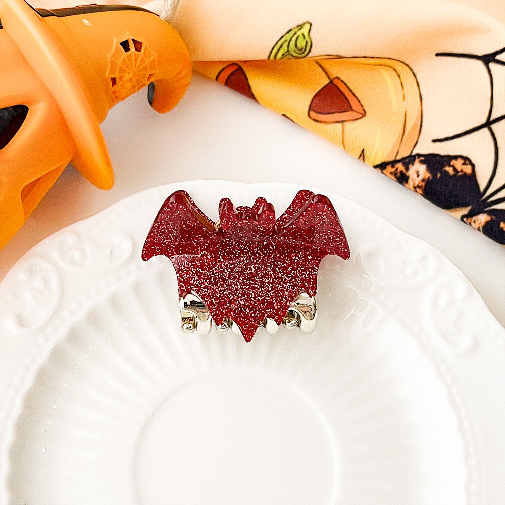 sparkly hair clips red bat