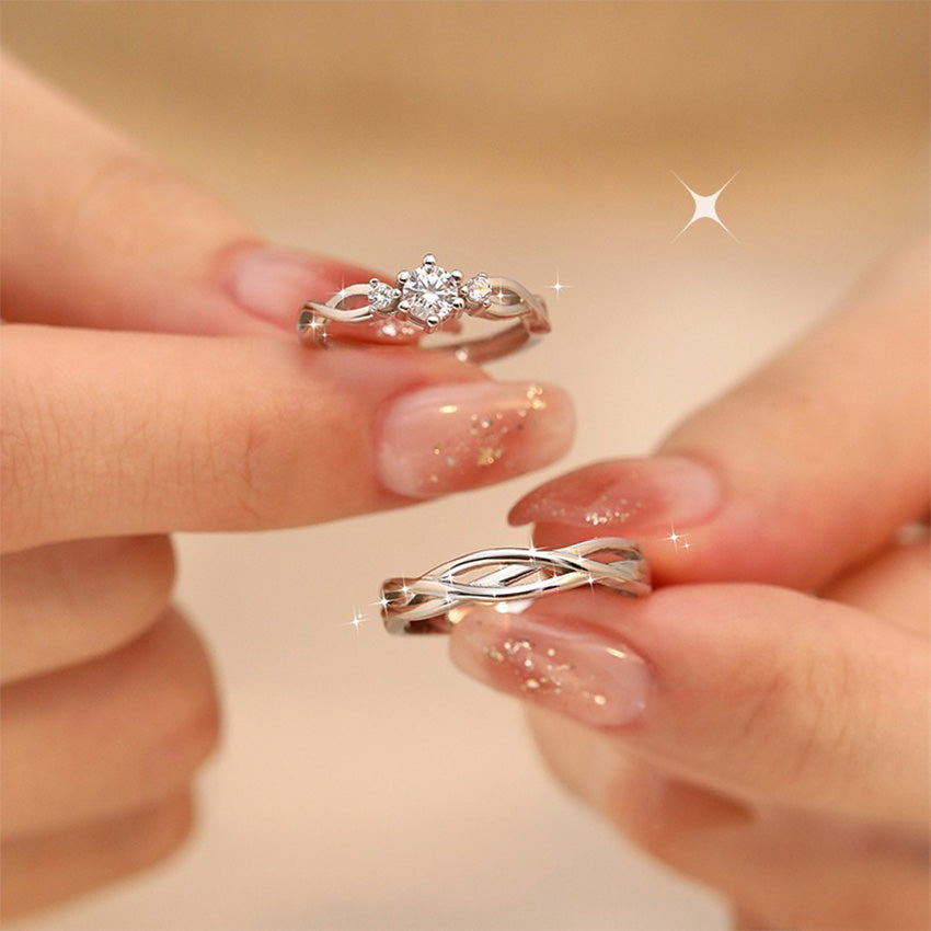 romantic silver couple ring set with engagement-style CZ stones and polished bands