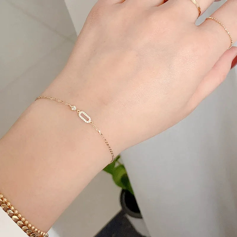 Minimalist cubic zirconia baguette bracelet styled with casual outfit