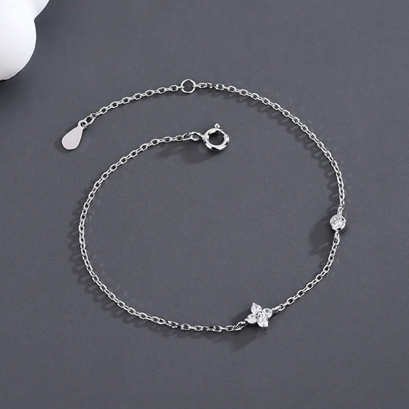 Dainty silver bracelet with four leaf clover charm for women, ideal birthday gift