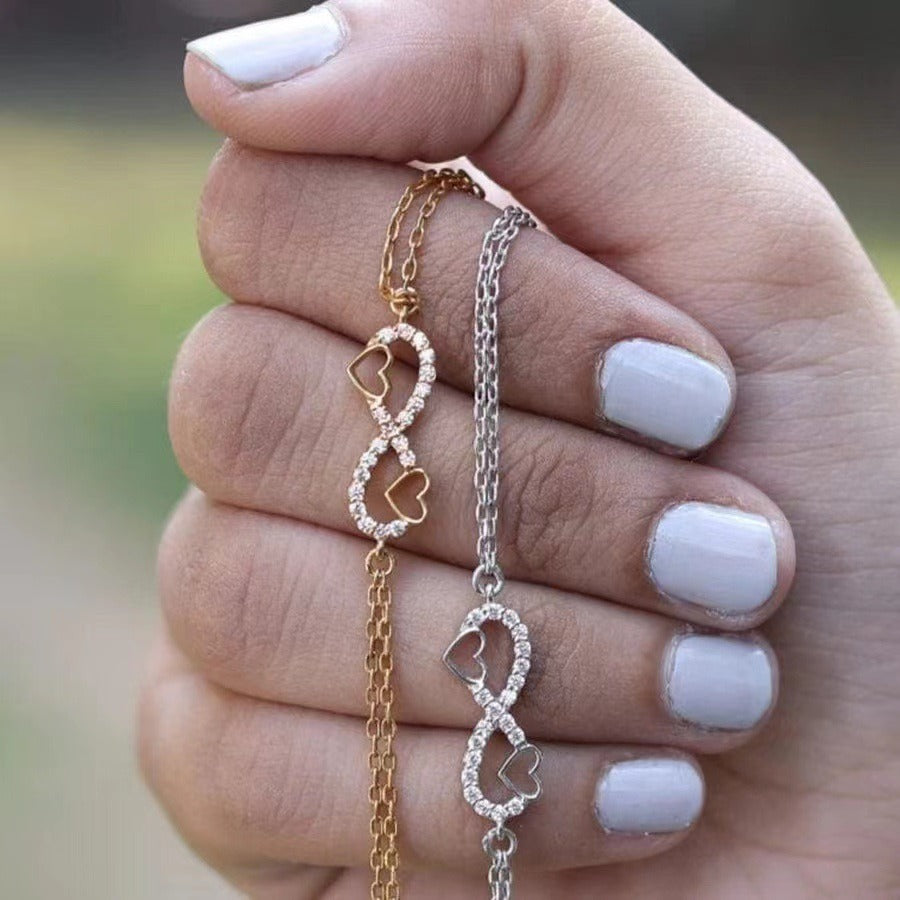 Elegant infinity heart bracelet with CZ stones, thoughtful graduation gift from mother to daughter
