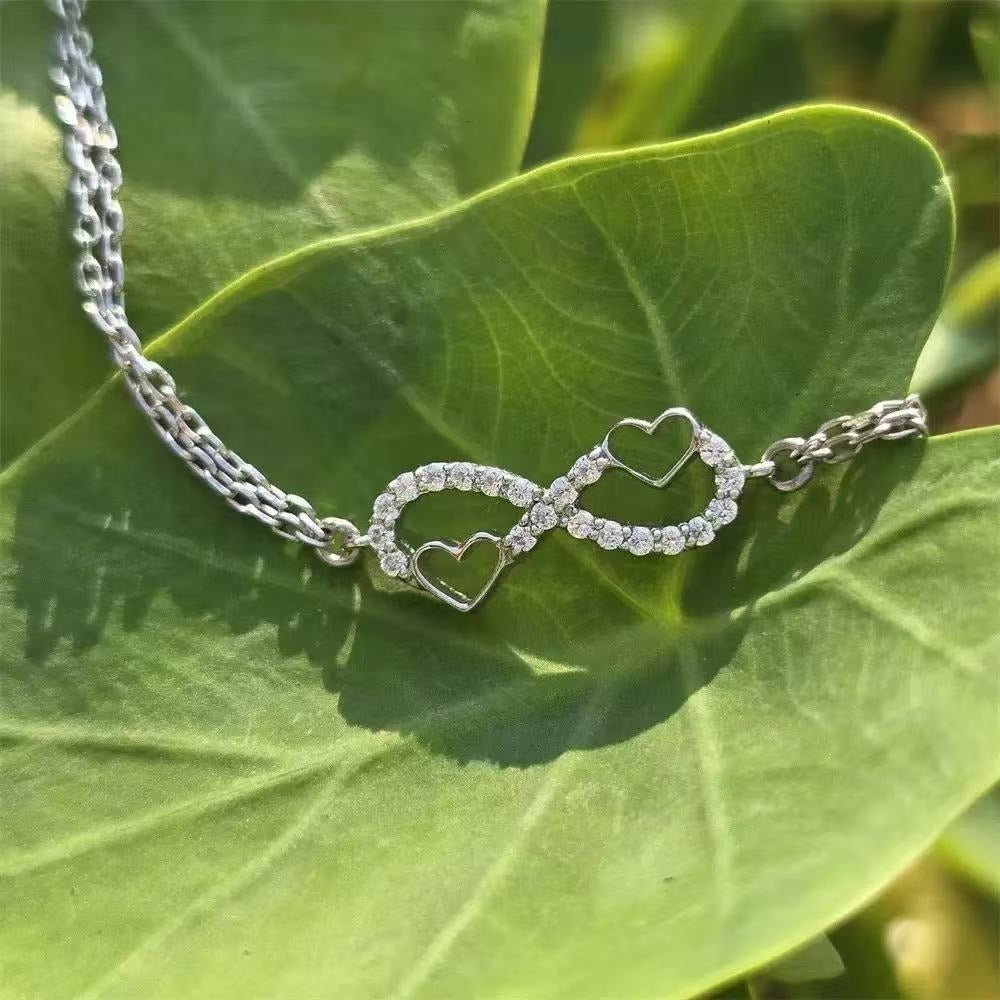 Dainty silver bracelet with double chain and infinity charm, graduation gifts for your daughter