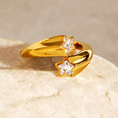 Alt text: Stackable gold star rings set of 5 with shiny zircon accents fashionable daily wear for women