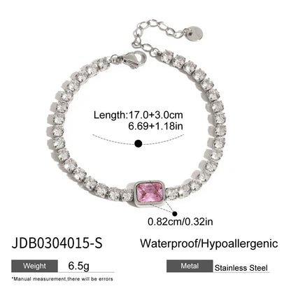 A stainless steel CZ tennis bracelet featuring a radiant pink cubic zirconia centerpiece, styled as elegant valentines jewelry for her. This pink tennis bracelet is a delicate and waterproof stainless steel gift set for her.