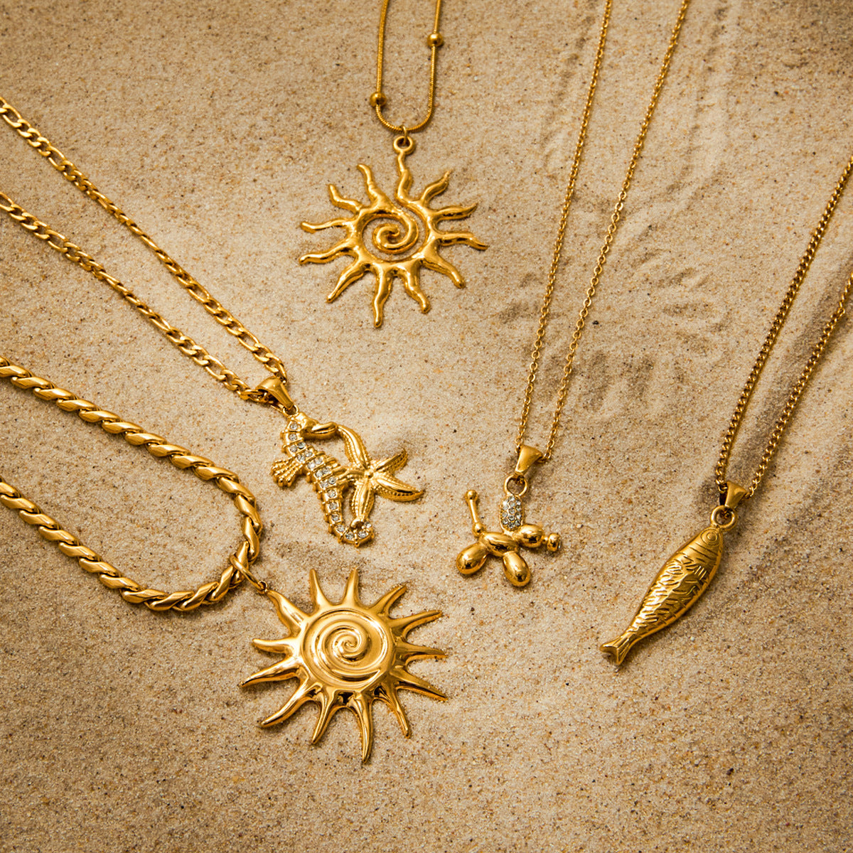 Close-up view of gold sun pendant necklace showing product dimensions and stainless steel waterproof hypoallergenic material quality.
