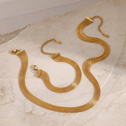 Elegant gold layered necklace and bracelet set styled with natural stone. This matching jewelry set is a perfect gift and fashionable stackable jewelry for girls.