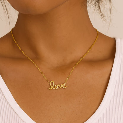 Flat lay of two gold necklaces including the gold love letter necklace, perfect as a Valentine’s Day necklace for her or romantic gift.