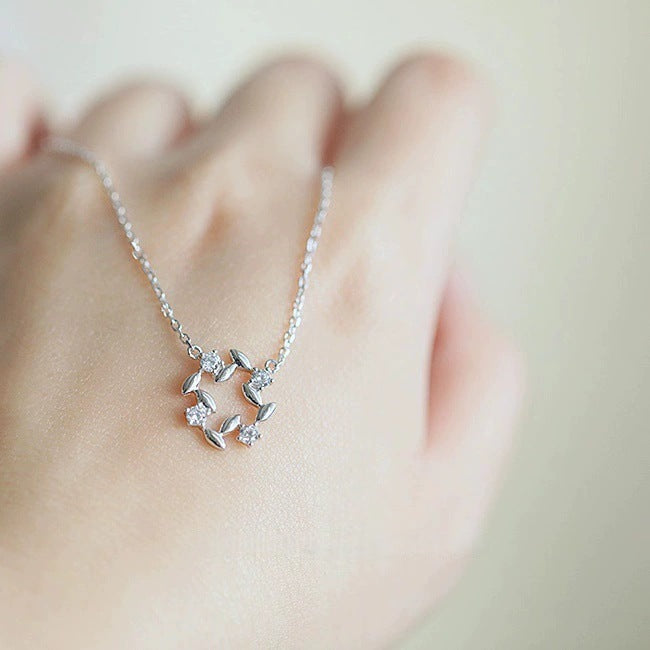 14K gold plated 925 silver zircon leaf pendant necklace worn on hand