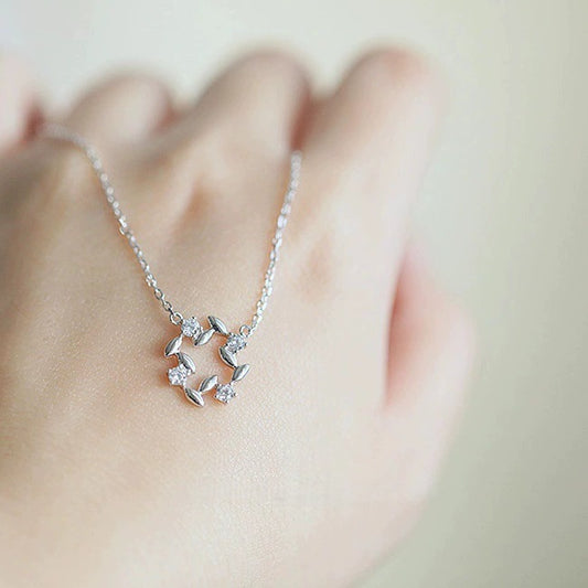 14K gold plated 925 silver zircon leaf pendant necklace worn on hand