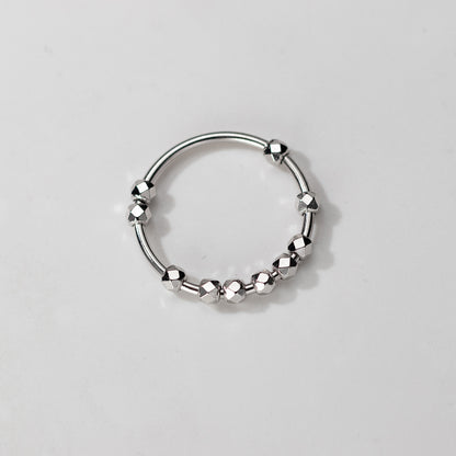 Open adjustable sterling silver bead ring with geometric faceted details