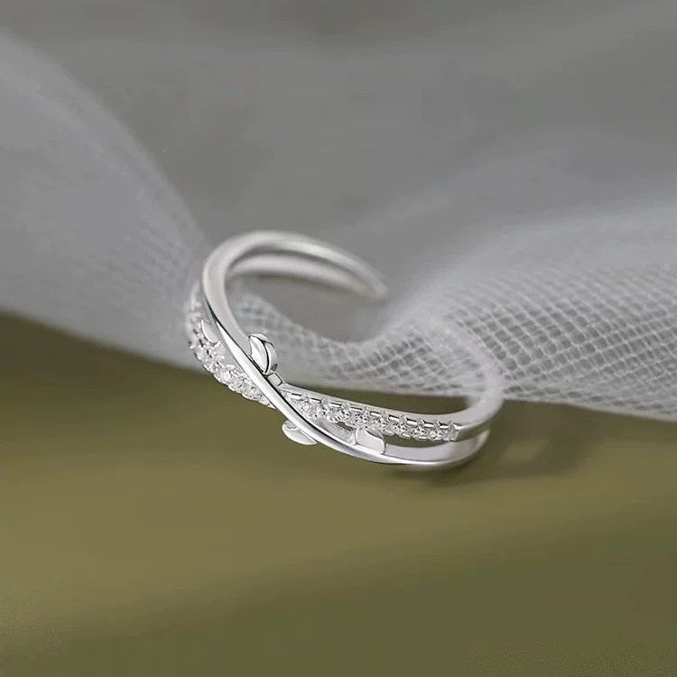 Adjustable S925 sterling silver leaf ring displayed with polished silver finish