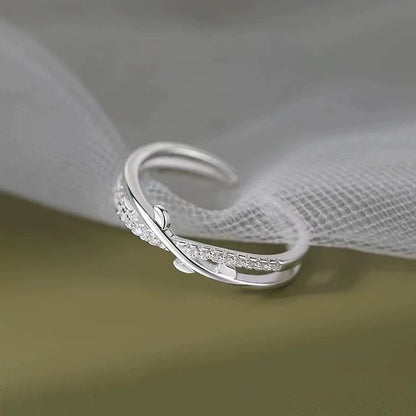 Adjustable S925 sterling silver leaf ring displayed with polished silver finish
