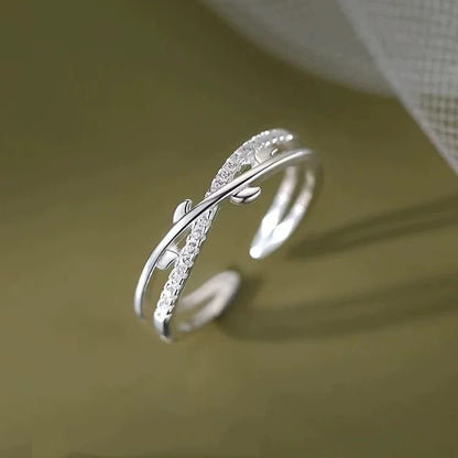 Close up of S925 sterling silver leaf open ring with sparkling accents