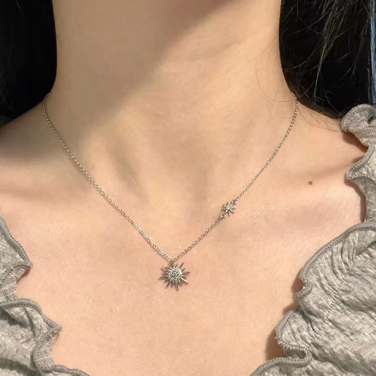 925 silver sun and star zircon necklace worn on neckline