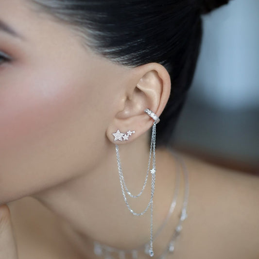 Close-up of cubic zirconia star tassel single ear cuff earring, 925 sterling silver, non pierced style for wholesale silver 925 jewelry markets.