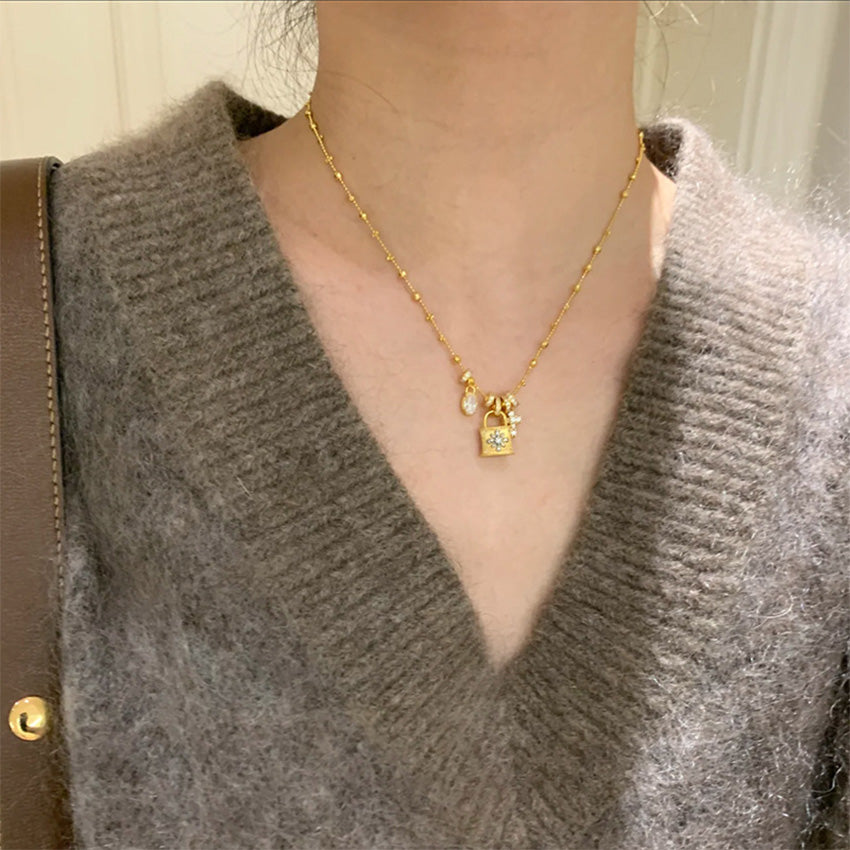 Gold plated brass chain necklace wholesale with lock pendant necklace design, padlock charm necklace, brass jewelry wholesale statement style