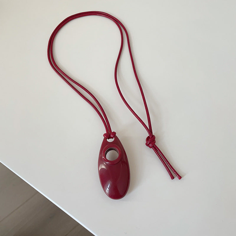 Red cord necklace with oval pendant minimalist statement fashion jewelry brass jewelry wholesale