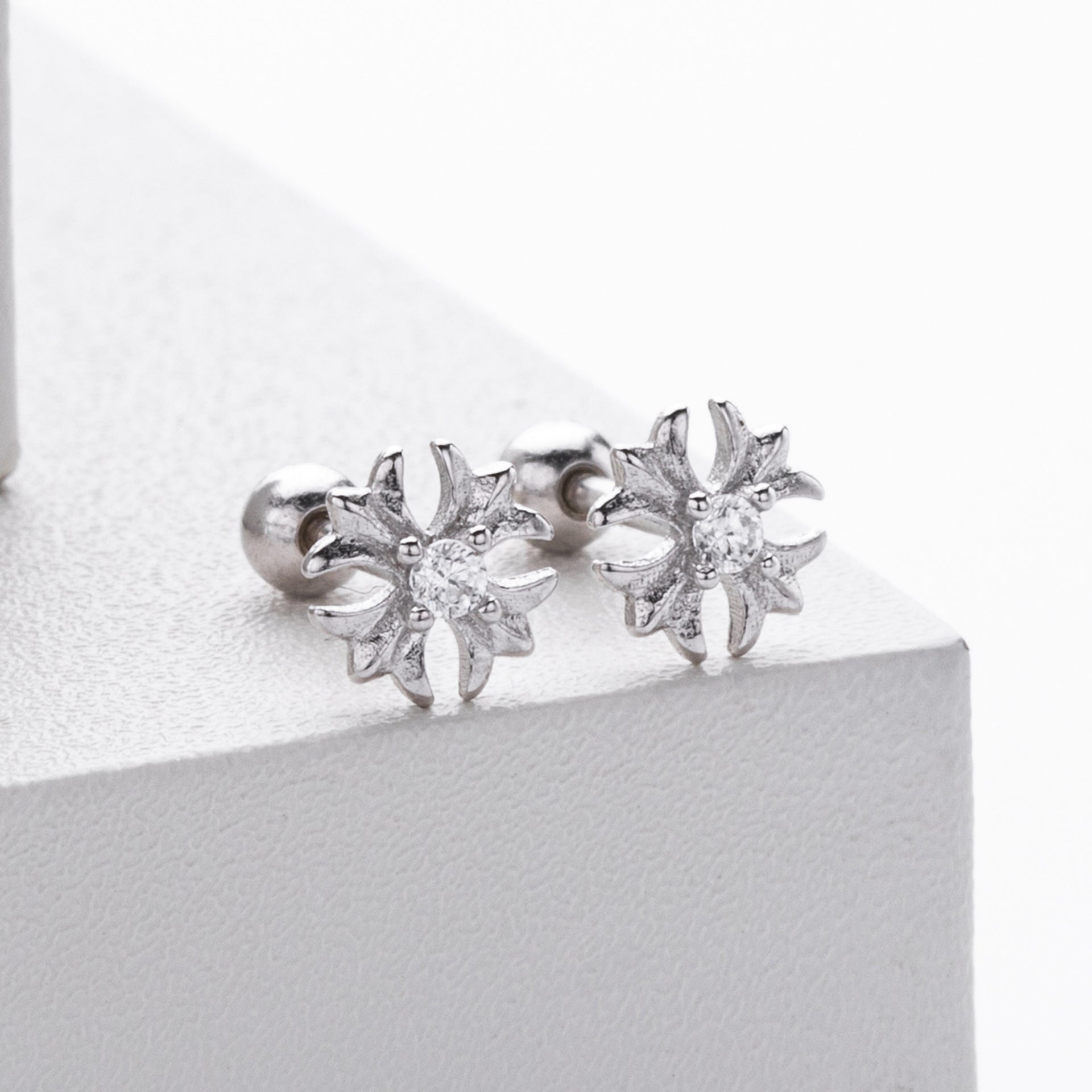cubic zirconia flower earrings silver color close up
