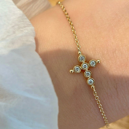 Detailed close up of 18k gold plated cross pendant backside highlighting fine jewelry craftsmanship