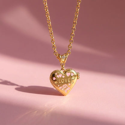 Heart photo locket pendant necklace on pink background with love and rose enamel details
