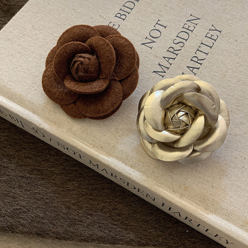 Brown leather flower brooch autumn winter fashion accessory