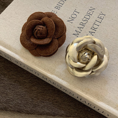 Brown leather flower brooch autumn winter fashion accessory
