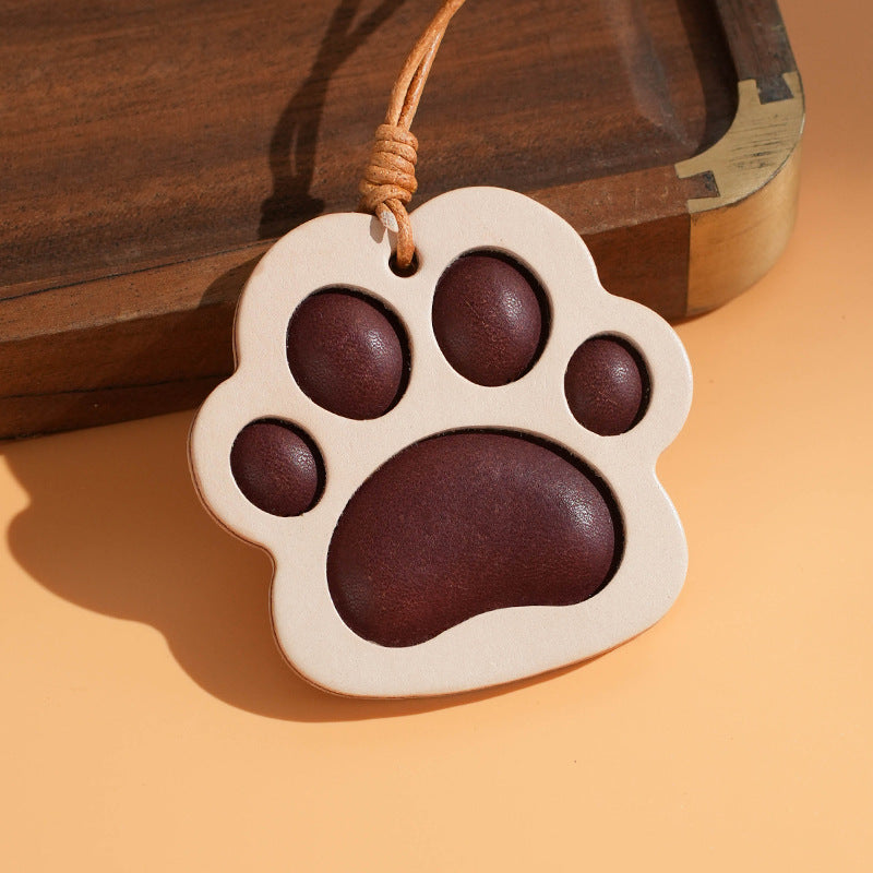 brown leather cat claw keychain – cute animal paw charm for bags, car mirrors, or pet lover gifts