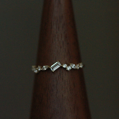 S925 sterling silver Nova Stardust Emerald Ring featuring emerald cut zircon and sparkling accent stones