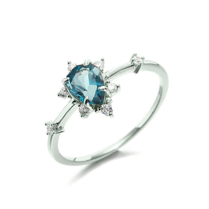 Ocean's Heart: 925 Sterling Silver Blue Topaz Ring