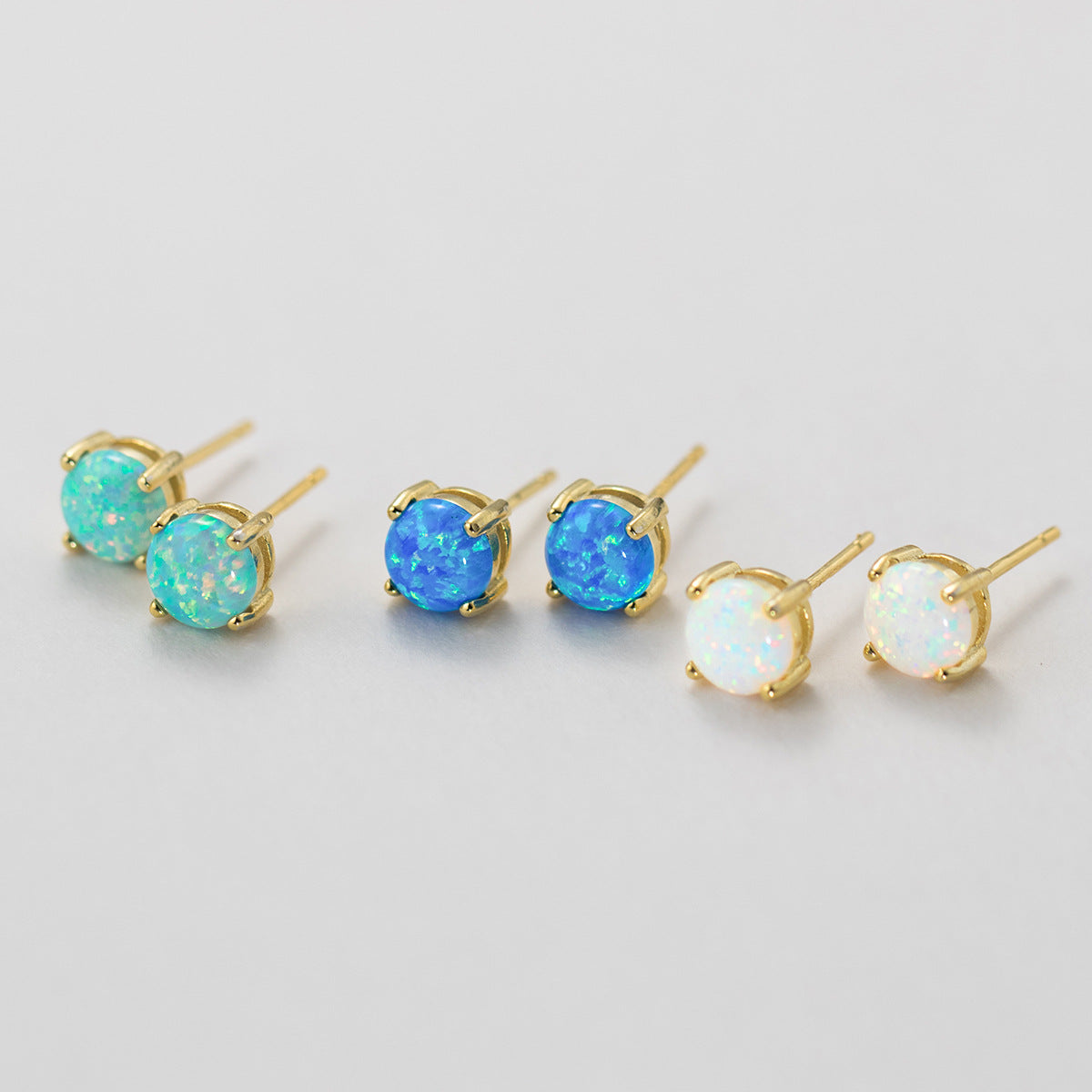 light blue, ocean blue, and white Opal Stud Earrings in 925 sterling silver gold plating