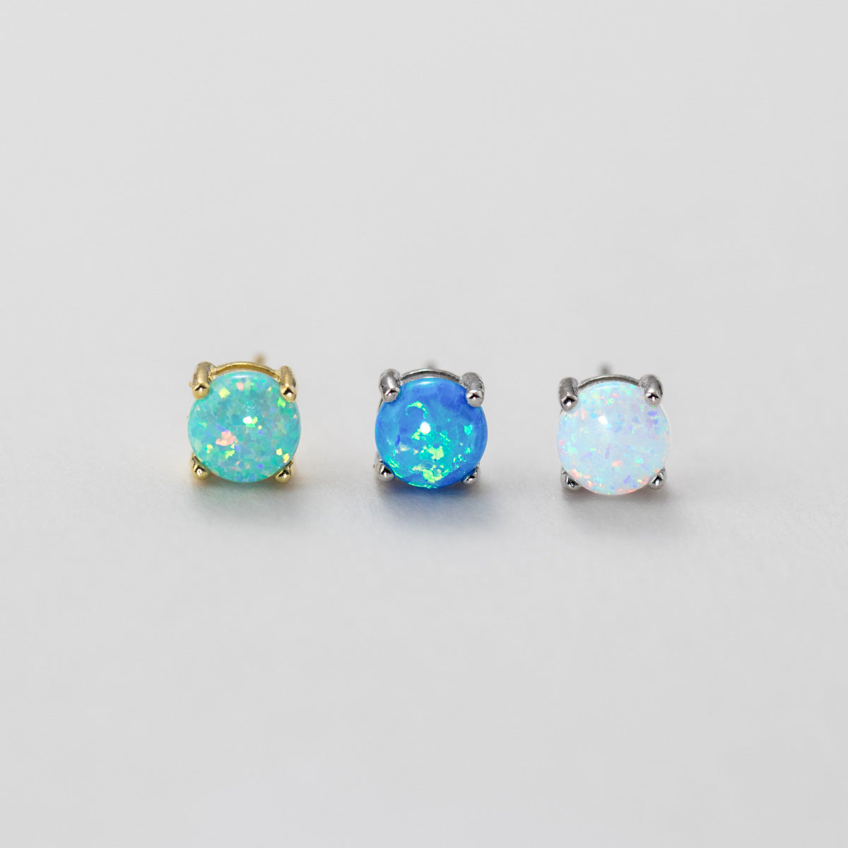 wholesale Opal Stud Earrings in light blue, ocean blue, and white