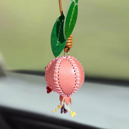 Handmade pomegranate charm genuine leather bag charm for handbag decoration, featuring realistic red bead seeds and green leaves, perfect as fruit bag charm or car rearview mirror charm for bag charm wholesale and fashion accessories wholesale collections.