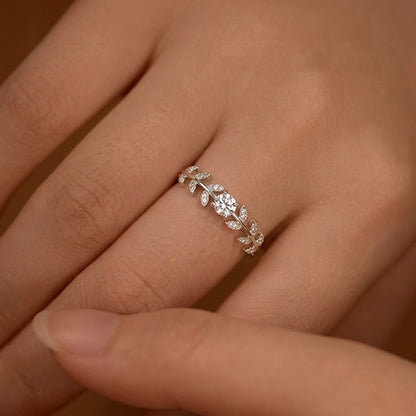Elegant 5MM Quiet Luxury Goddess Ring worn on finger with botanical leaf inspired design