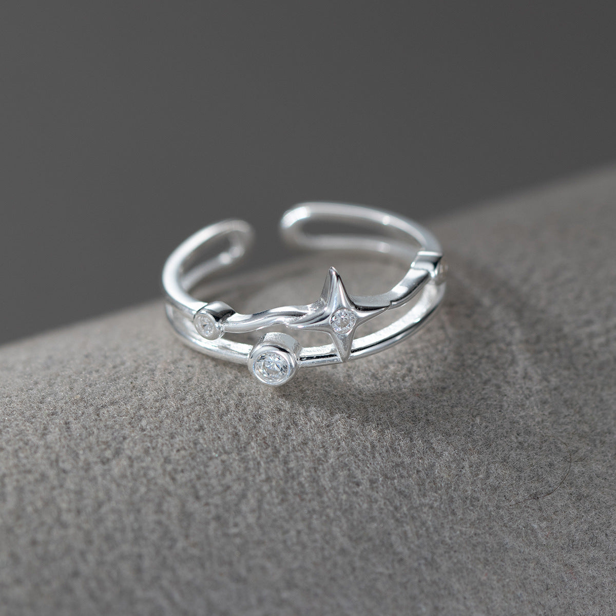 Woman wearing S925 sterling silver Cosmic North Star Ring with double layer celestial design