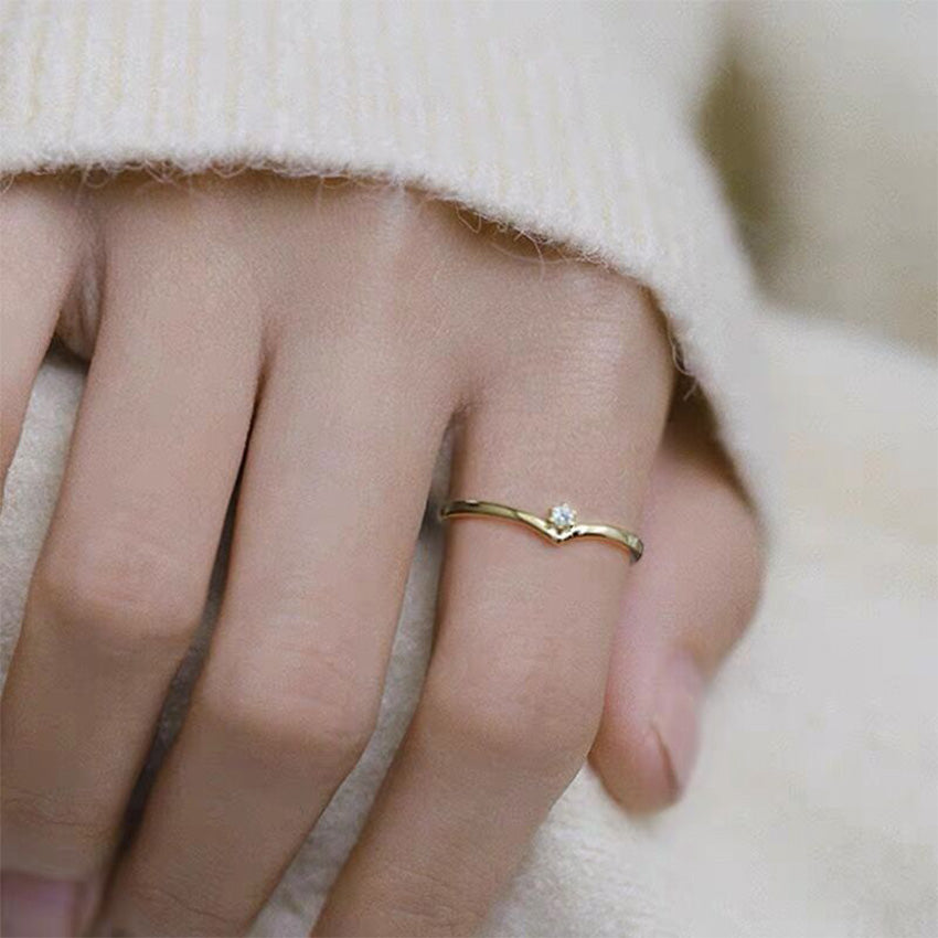 Minimalist bridal inspired solitaire ring crafted from sterling silver and 14K gold plating