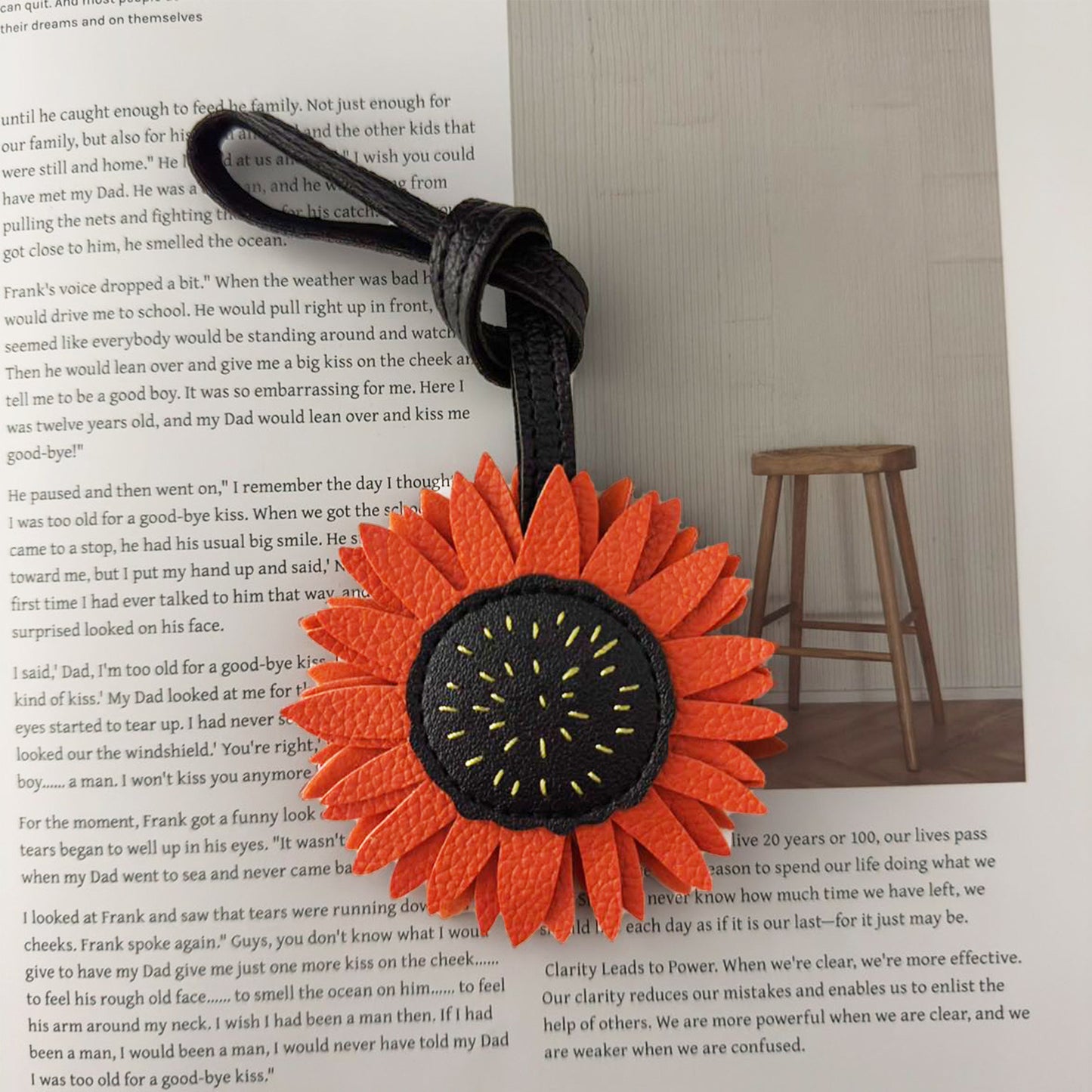 Sunflower bag charm wholesale PU leather keychain on magazine background perfect for Christmas keychain gift and bag charm wholesale collections