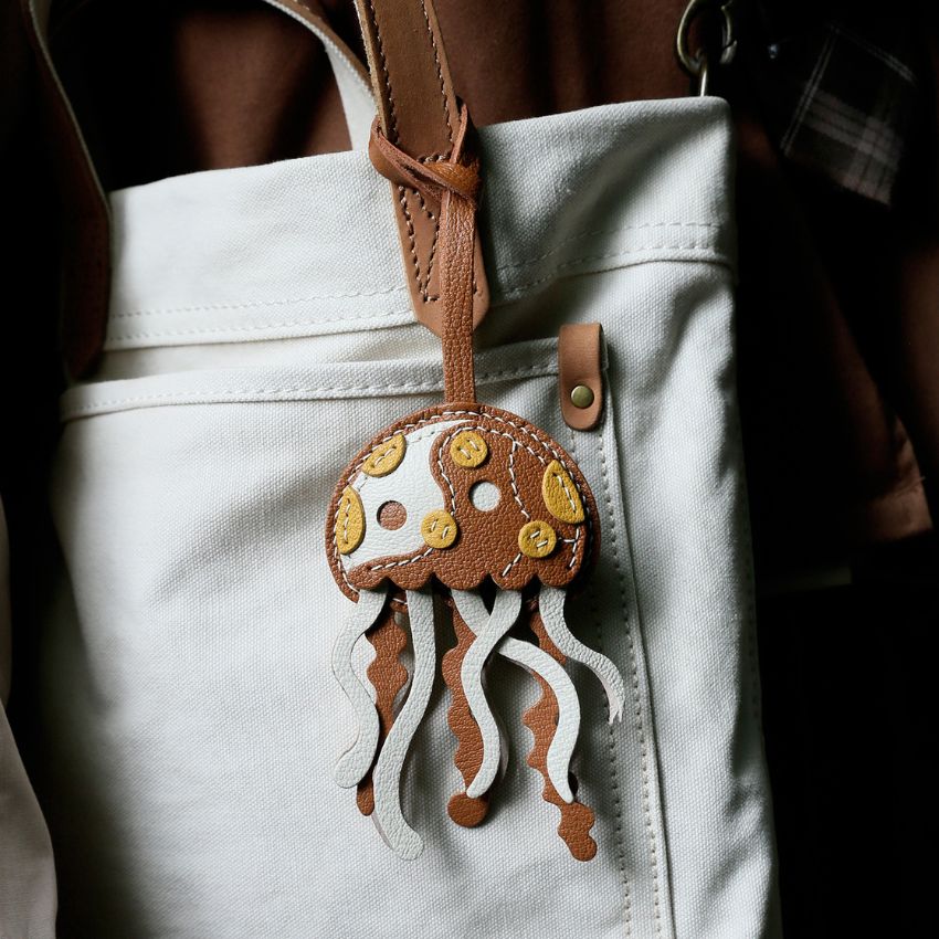 Cute Jellyfish Bag Charm Wholesale Sheepskin Leather PU Keychain held in hand for fashion accessories wholesale and gift exchange ideas