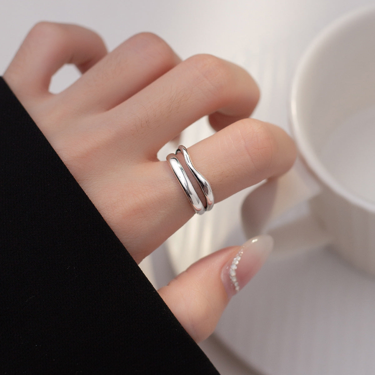 a women wearing a Wave Ring Double Layered 925 Sterling Silver