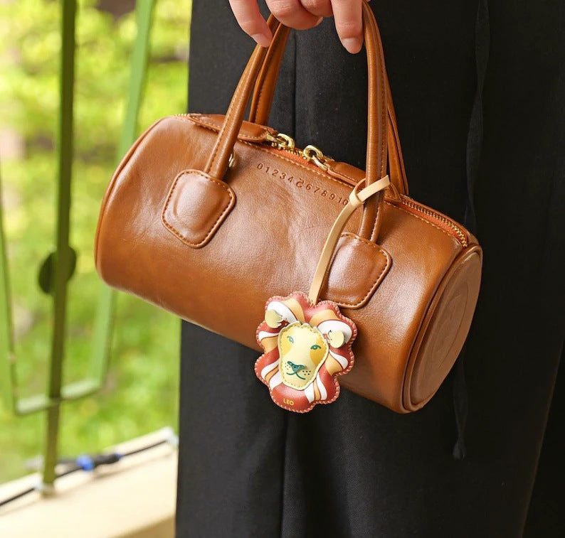 Zodiac bag charm wholesale set with Pisces Cancer and Scorpio handmade leather keychain charms for handbags and fashion accessories wholesale buyers