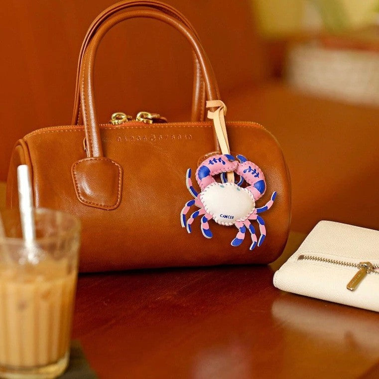 Virgo zodiac bag charm wholesale design in handmade leather keychain style attached to brown handbag perfect fashion gift for girlfriend or best friend