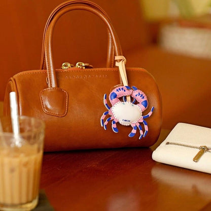 Virgo zodiac bag charm wholesale design in handmade leather keychain style attached to brown handbag perfect fashion gift for girlfriend or best friend