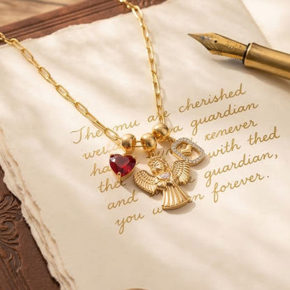 Gold tone paperclip chain necklace with angel charm heart crystal and heart lock pendant