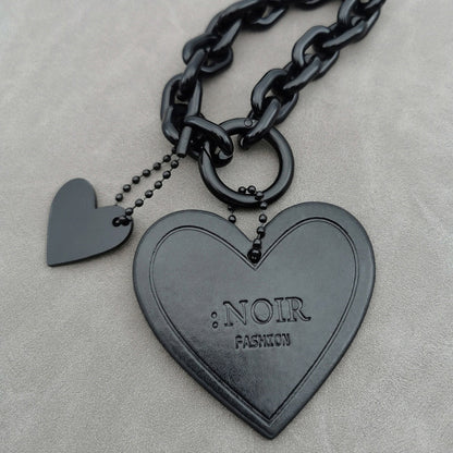 leather heart bag charms with debossed logo