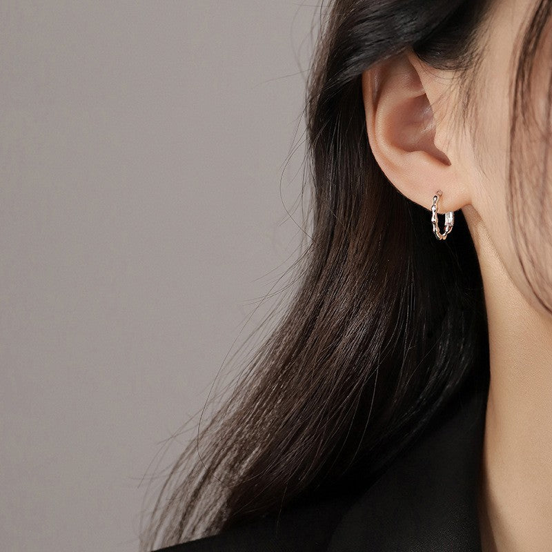 Lightweight bamboo inspired sterling silver huggie hoop earrings for women
