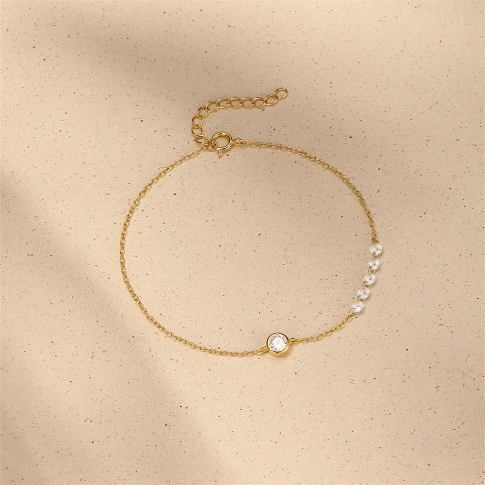 Gold plated S925 silver bezel set round zircon bracelet for wholesale.