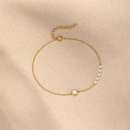 Gold plated S925 silver bezel set round zircon bracelet for wholesale.
