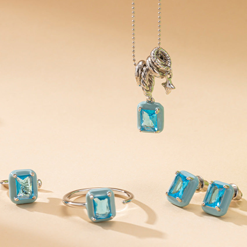 Blue crystal pendant necklace and matching stud earrings five piece set