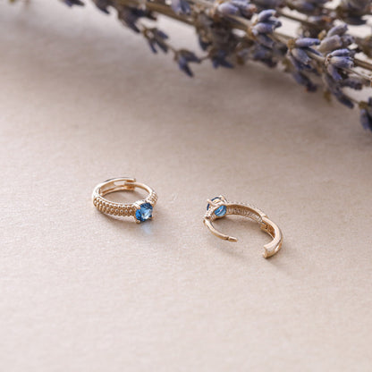 S925 sterling silver blue sapphire huggie earrings with 18K gold plated finish and vintage beaded detailing