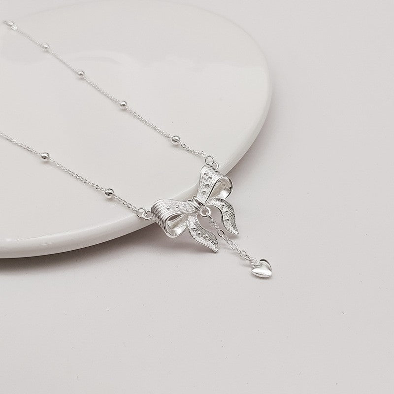 ainty-Silver-Bow-Heart-Necklace-for-Women-Boutique-Collection